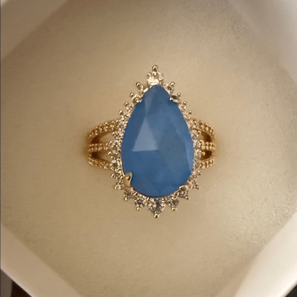 Gold Band Ring with Blue Teardrop Stone